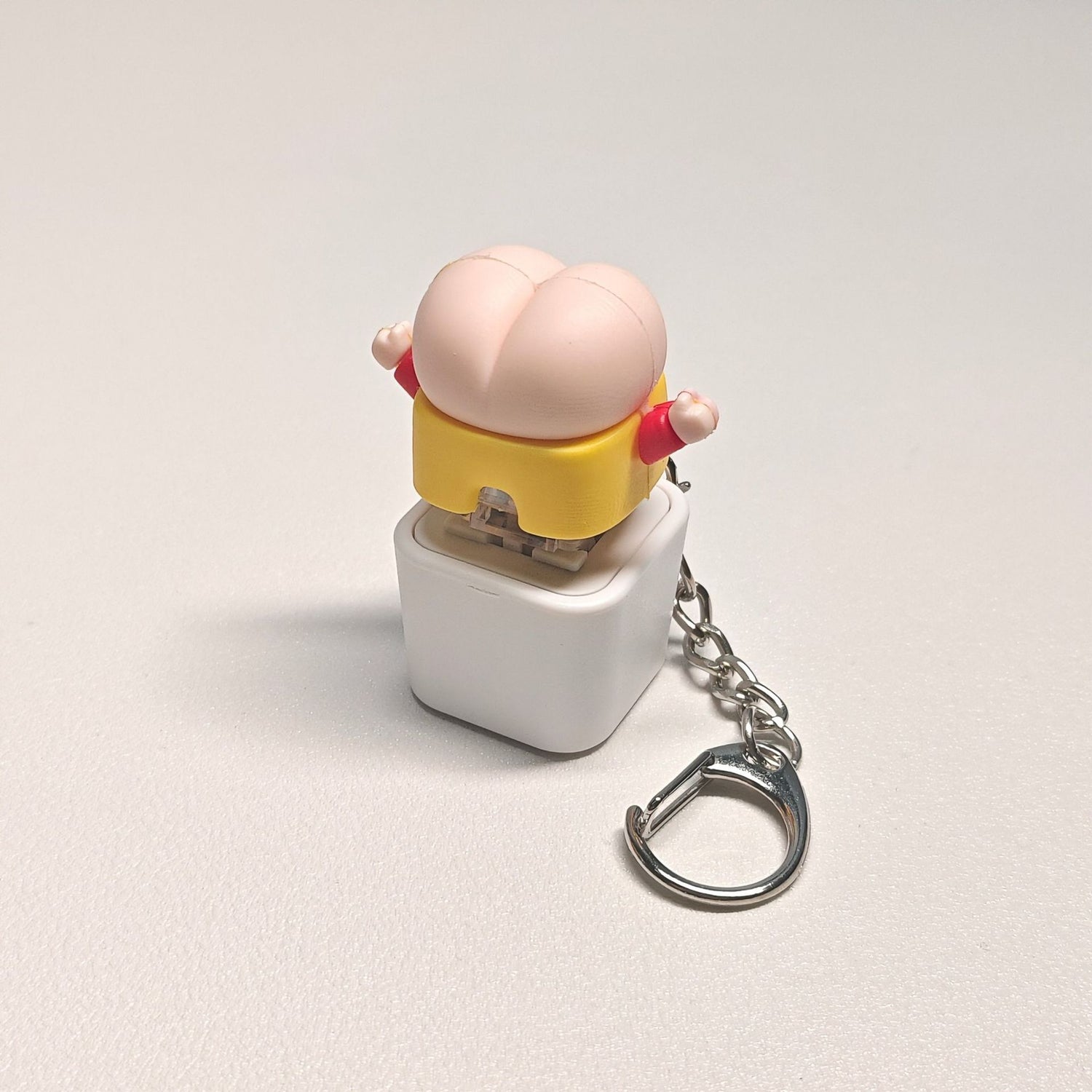 Axis tester button, keyboard peripheral toy